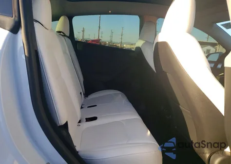 2023 Tesla Model Y from USA, damaged, VIN 7SAYGDEE2PA085770